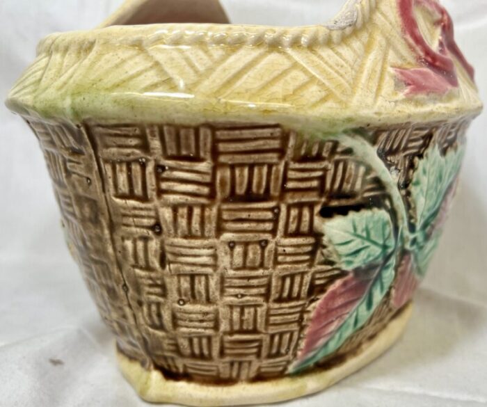 antique 19th century majolica basket planter with intricate weave pattern and delicate white flowers 3940