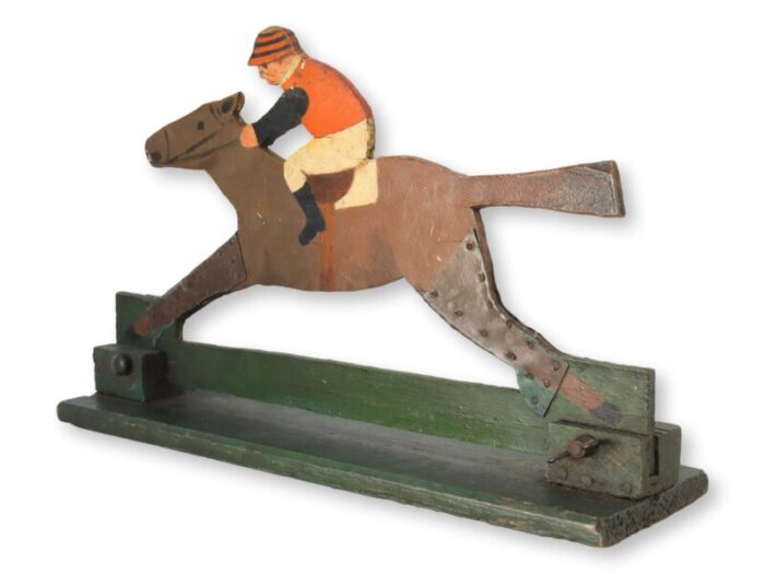 antique horse and jockey game carving 1940