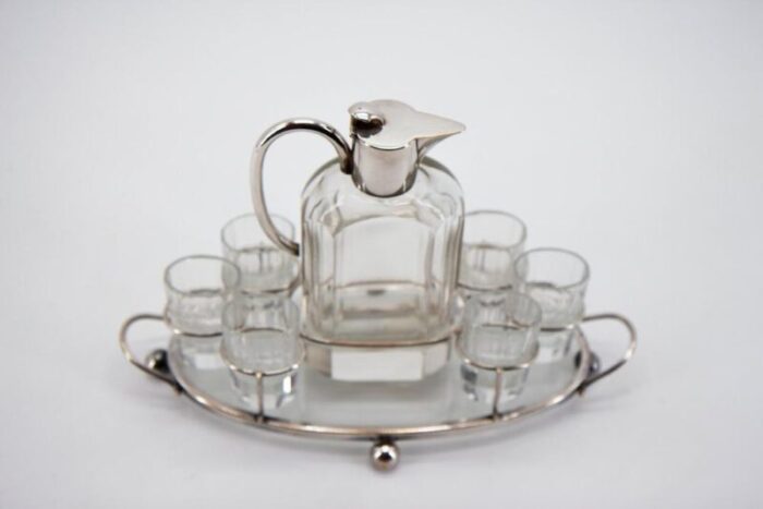 crystal and steel liqueur set set of 8 4900