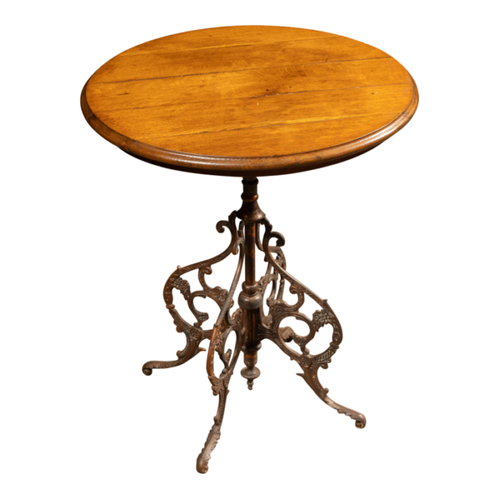 early 20th century bistro table with japanned base 3124