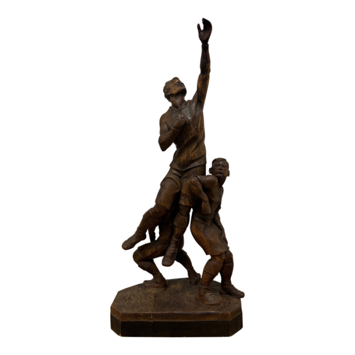 early 20th century carved wood figure sculpture of three rugby players 9728