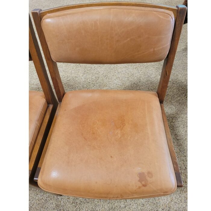 four vintage mcm teak and leather side chairs 6548