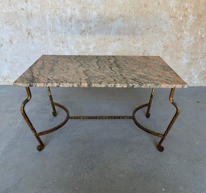 french gilt iron coffee table with pink and black marble top 3817