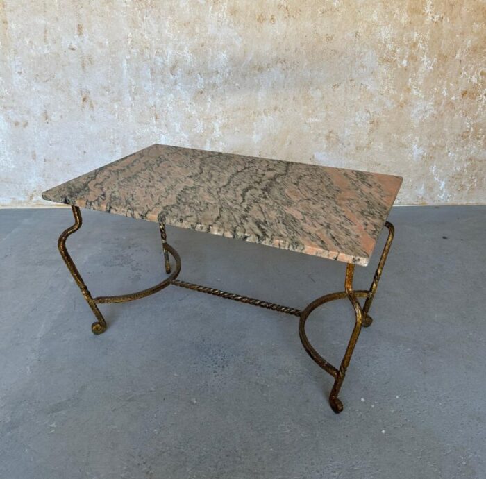 french gilt iron coffee table with pink and black marble top 6331