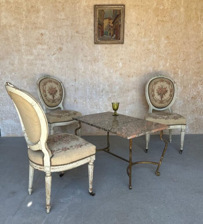 french gilt iron coffee table with pink and black marble top 7166