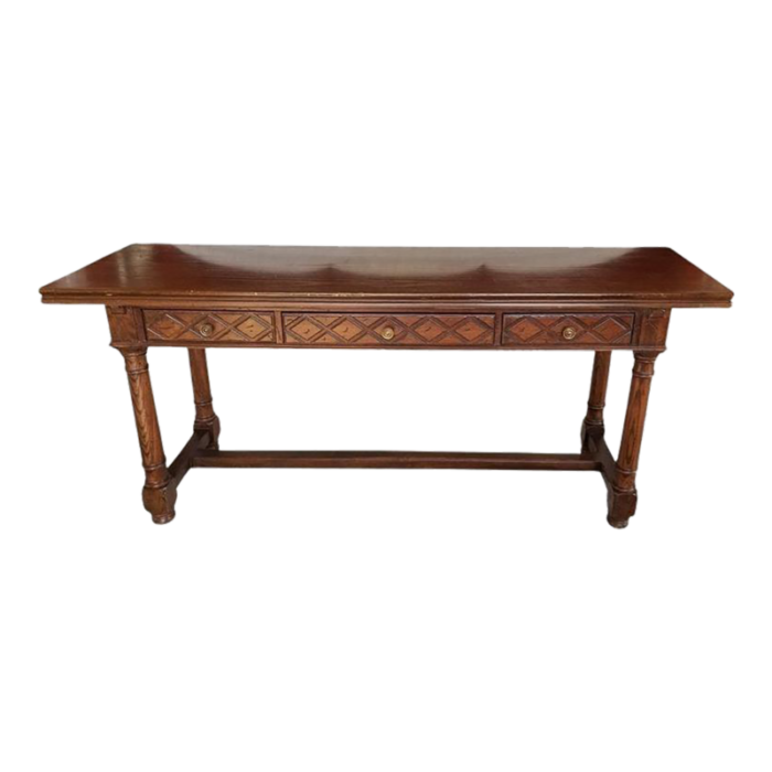 harvest table with fold up top and flanked by three drawers 20th century 1242