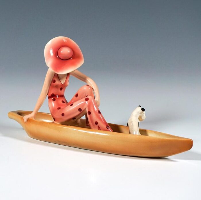 lady with fox terrier in boat from goldscheider vienna dakon 1935 2518