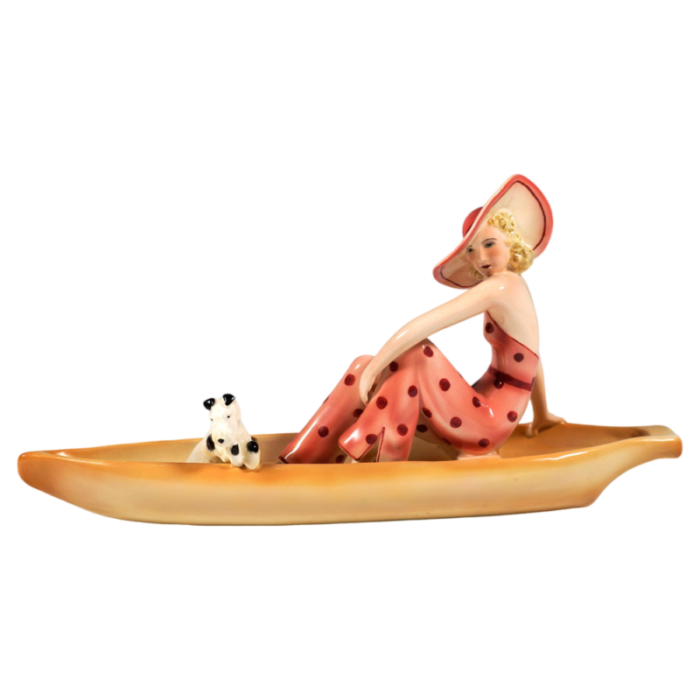 lady with fox terrier in boat from goldscheider vienna dakon 1935 2671