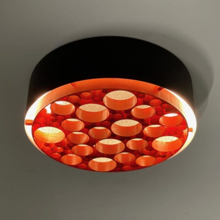 large alliance ceiling lamp with orange rings from raak 1970s 3