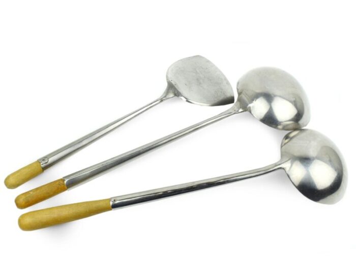 late 20th century handcrafted stainless steel cooking ladles and a turner utensils set with wooden long handle 3 pieces 9433