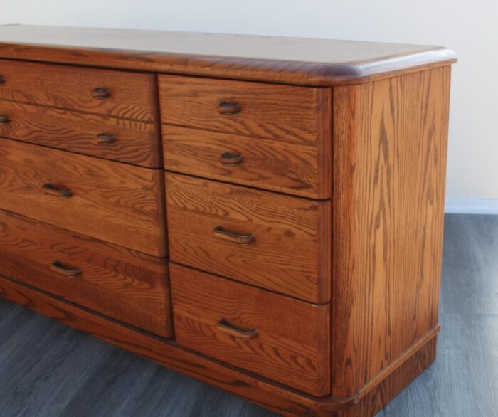 late 20th century mission style oak dresser of nine drawers 0186