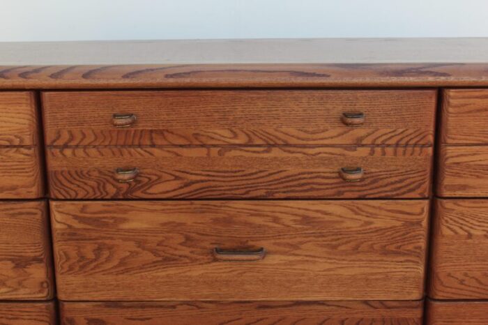 late 20th century mission style oak dresser of nine drawers 1168