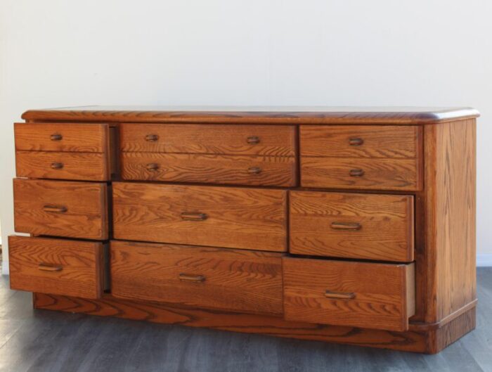 late 20th century mission style oak dresser of nine drawers 3995