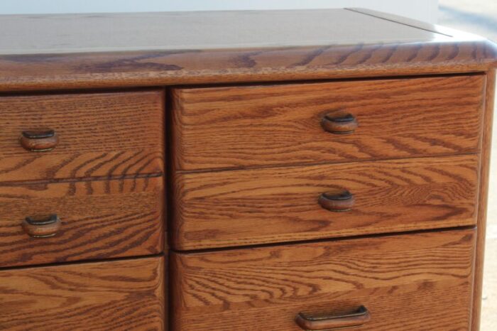 late 20th century mission style oak dresser of nine drawers 4032