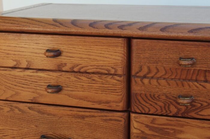 late 20th century mission style oak dresser of nine drawers 8121