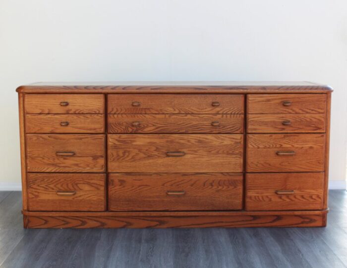 late 20th century mission style oak dresser of nine drawers 9127