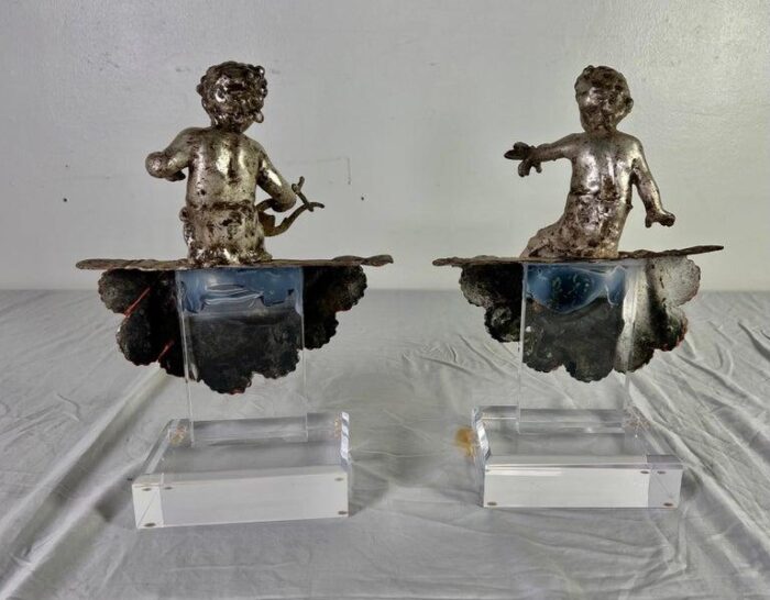 pair of french silvered gilt metal cherubs on lucite bases 2825