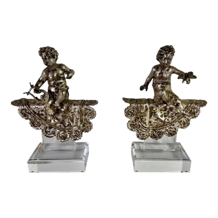 pair of french silvered gilt metal cherubs on lucite bases 6307