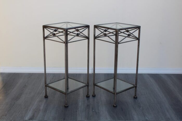 pair of late 20th century pedestal two tiered metal tables 3482