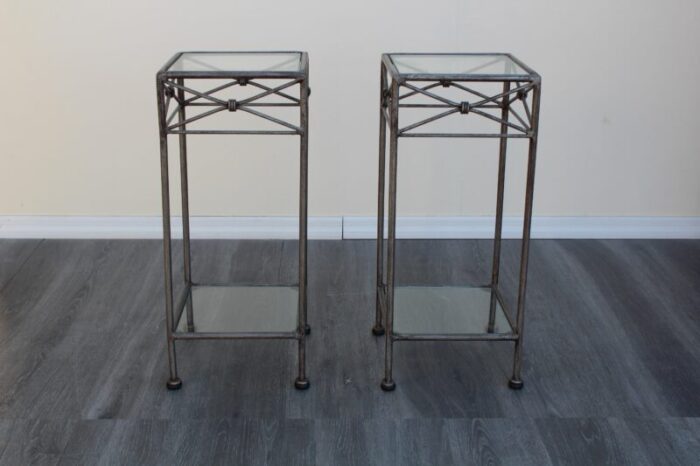 pair of late 20th century pedestal two tiered metal tables 9509