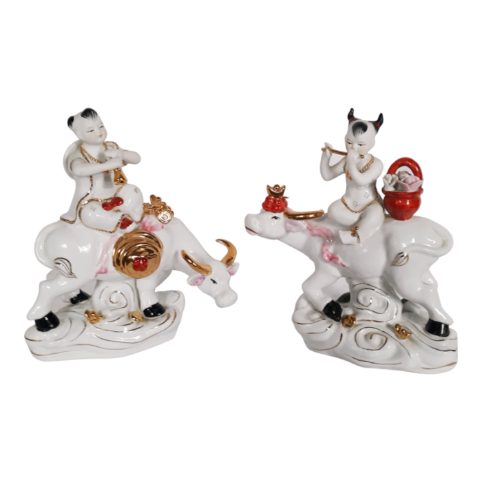 pair of vintage chinese porcelain children sitting on water buffalos 3846