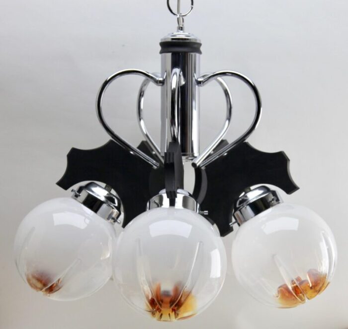 pendant with 5 globes of clear glass with orange inclusions from mazzega 1