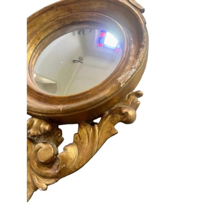 round mirror with an eagle 0386