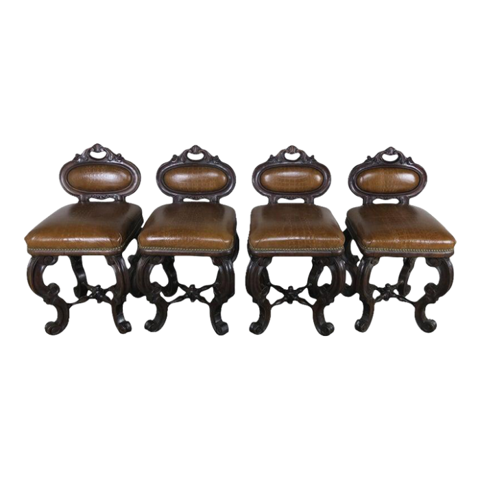 set of four french embossed leather stools circa 1900 1824