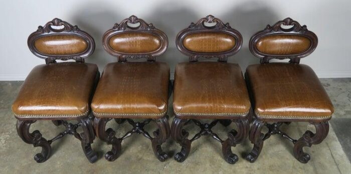 set of four french embossed leather stools circa 1900 5816