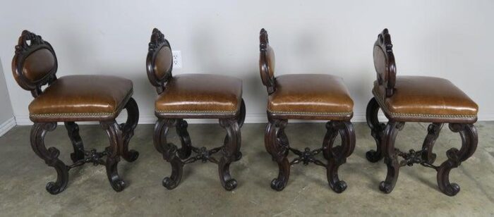 set of four french embossed leather stools circa 1900 9715