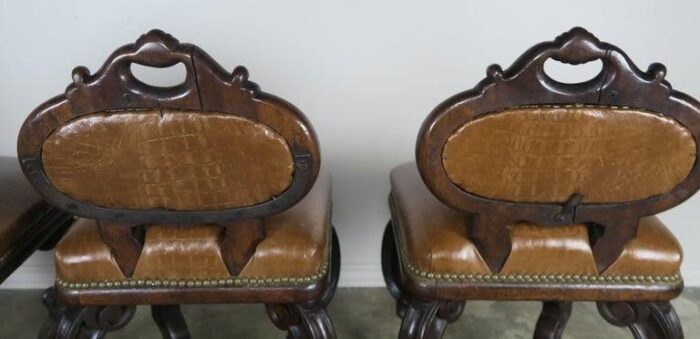 set of four french embossed leather stools circa 1900 9952