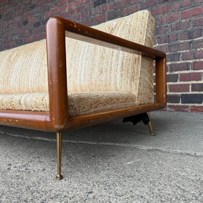 t h robsjohn gibbings style walnut framed sofa with brass legs 1844