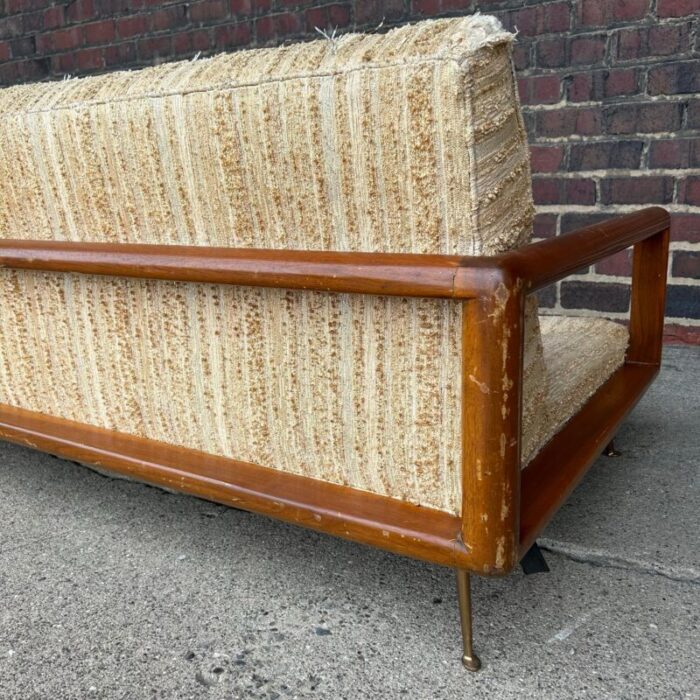 t h robsjohn gibbings style walnut framed sofa with brass legs 5943