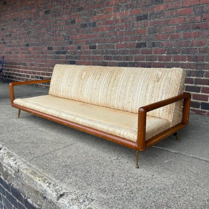 t h robsjohn gibbings style walnut framed sofa with brass legs 6627