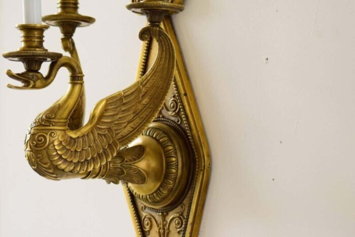 very large wall lamp with swan figure 8