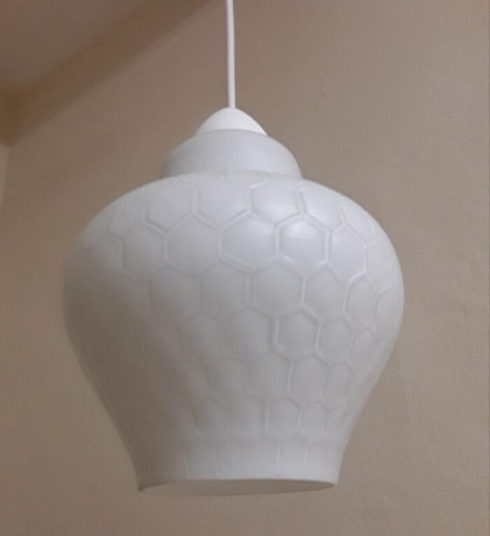 vintage ceiling lamp with glass shade in white overlaid glass with honeycomb structure on white plastic mount 1970s 9113