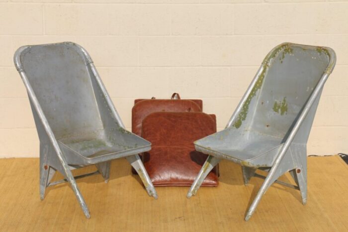 vintage leather airplane chairs with riveted aluminum and leather cushions 5264