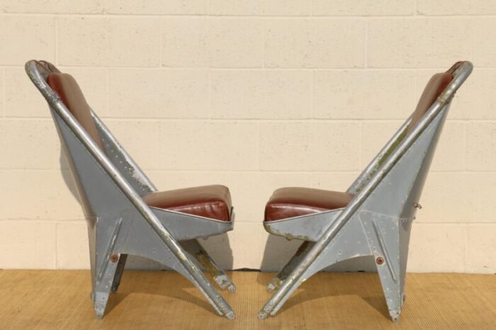 vintage leather airplane chairs with riveted aluminum and leather cushions 8599