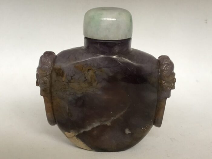 vintage moss agate snuff bottle with ringed lion masks 8702