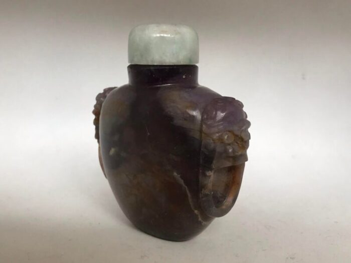 vintage moss agate snuff bottle with ringed lion masks 9356