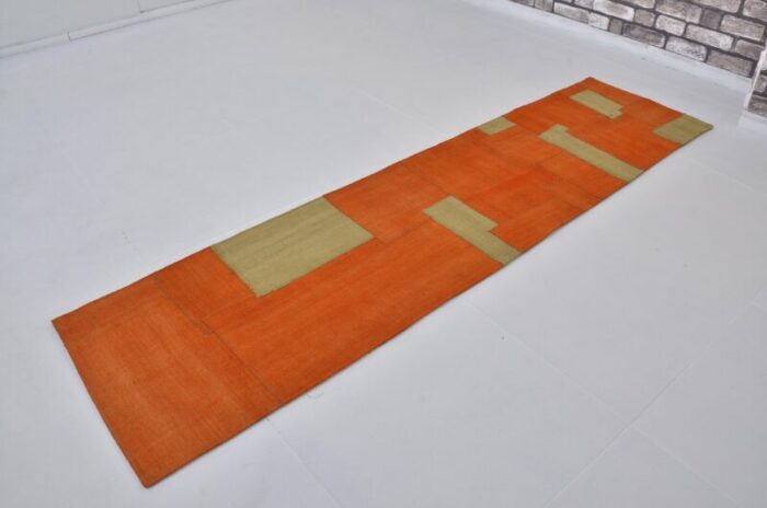 vintage tribal runner rug in orange and green 1960 1543