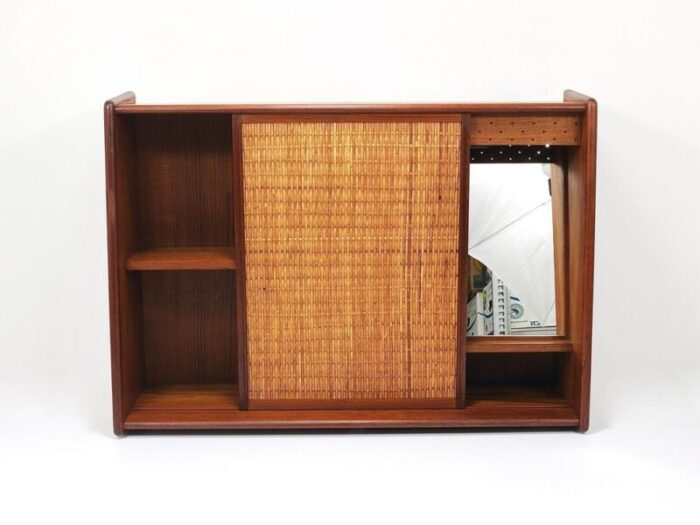 wall mirror and shelf cabinet in teak and cane attributed to arne wahl iversen for brenderup denmark 1960s 8638