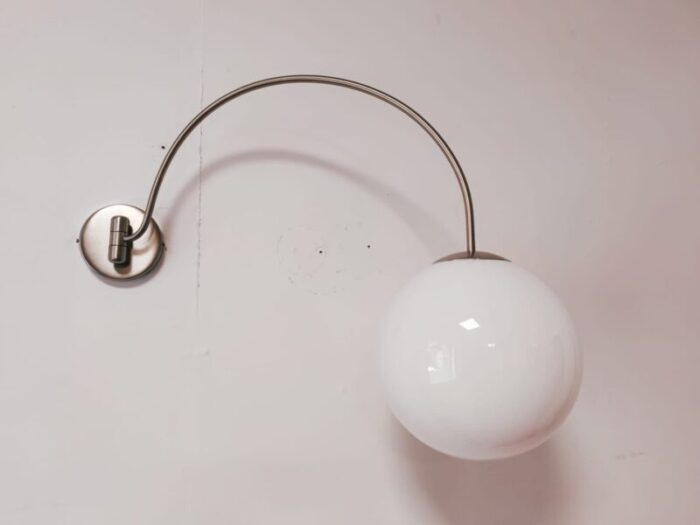 white sphere wall lamp with adjustable arm 2